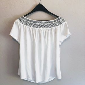 Smocked off-the-shoulder white shirt